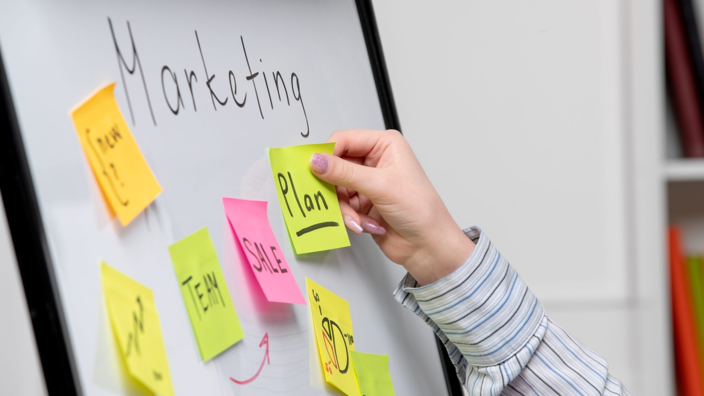 marketing-young-cute-business-lady-striped-shirt-office-creating-new-marketing-plan